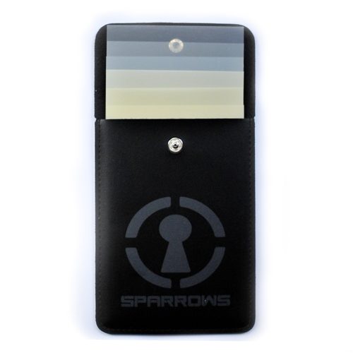 The Sparrows Quick Jim is an innovative tool designed to work similarly to the old credit card trick, making it incredibly versatile for quickly opening almost any knob, gate, or live spring latch, including window catches. Whether you're dealing with a door, gate, or window, the Quick Jim can get the job done efficiently. Simply slide the shim into the door gap, locate the front of the latch, and push forward while pulling the door open. The oversized shims are flexible, allowing for easy customization for special applications, ensuring you have the right tool for any situation. Set Includes: 6 x Oversized shims in two different thicknesses 1 x Case Why Choose Sparrows Quick Jim? Versatile: Works on a wide range of locks, including doors, gates, and window catches. Customizable: Oversized shims can be cut and modified to suit specific needs. Convenient: Compact design with a carrying case for easy transport and storage.